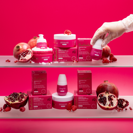 Cosmetic products with pomegranate elements on a pink background